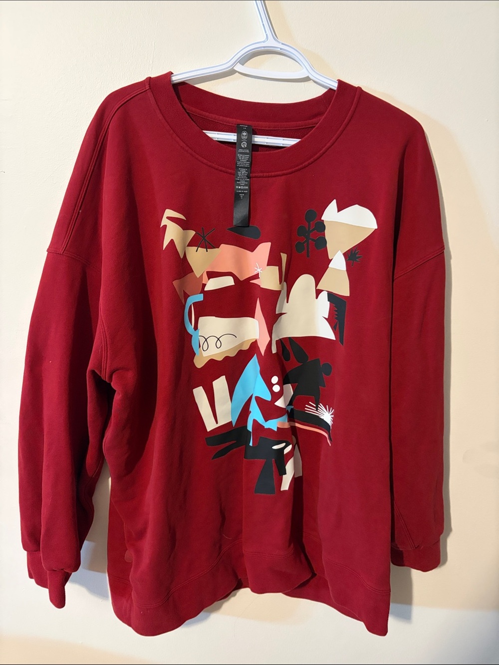 lululemon athletica Olympics Red Crewneck Sweater with Multicolor Abstract Print